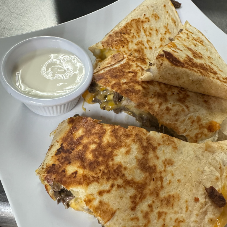 Indulge in Our Quesadilla